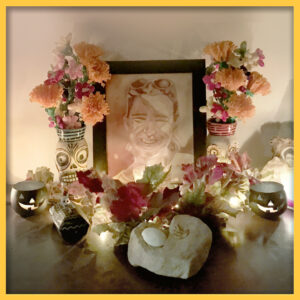 hoto courtesy of Nicolasa Chávez. Image of the author’s personal altar. In the center is a drawing of the author’s sister Christel Angélica Chávez, Captain US Air Force. Drawing by Anthony Thielen (cousin).