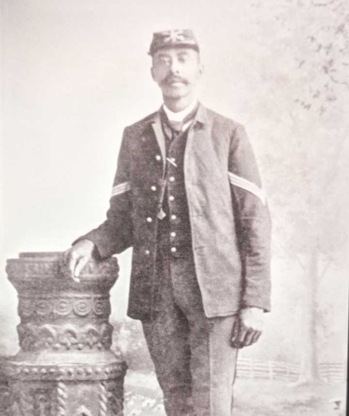Black and white photo portrait c. 1879 of Sergeant John Denny in uniform
