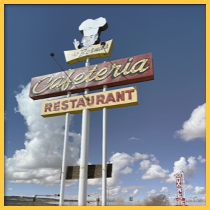 Photo of a sign that read's "Chef Bernie's Cafeteria Restaurant" with a cartoon chef