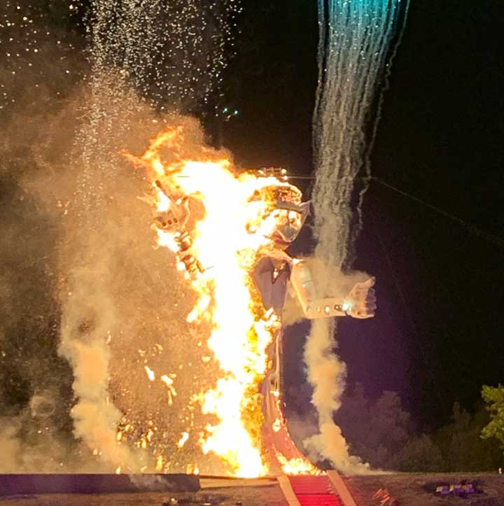 Zozobra, a 50 foot effigy of "old man gloom" consumed in flames and smoke