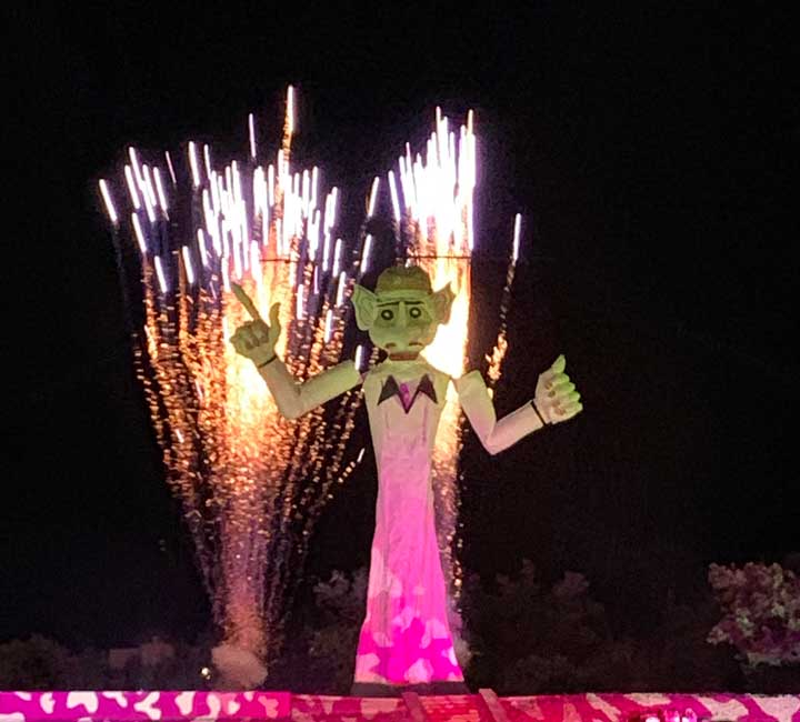 Zozobra, a 50 foot effigy of "old man gloom" with fireworks launching behind it