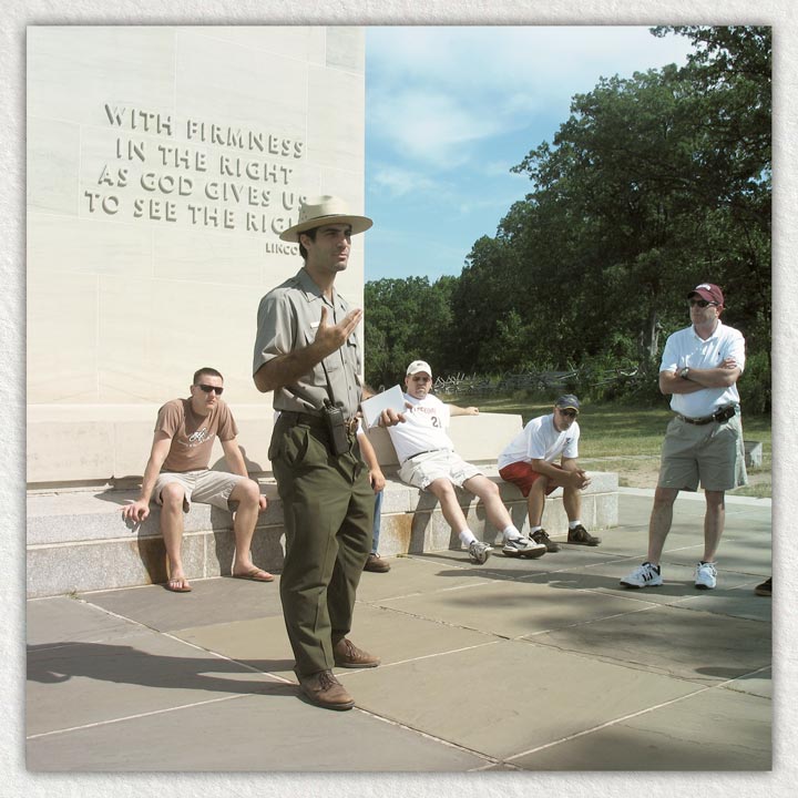 Raffi Andonian dressed as a park ranger presenting in front of the Lincoln Monument