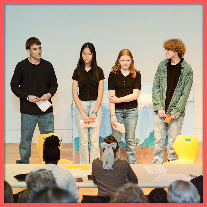 4 students answering questions for NHD judges